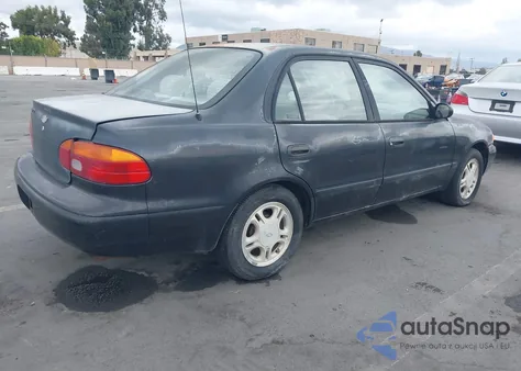 1999 Chevrolet Prizm Lsi z USA, uszkodzony, nr VIN 1Y1SK5283XZ412109